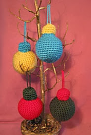 http://www.ravelry.com/patterns/library/crocheted-holiday-ornaments