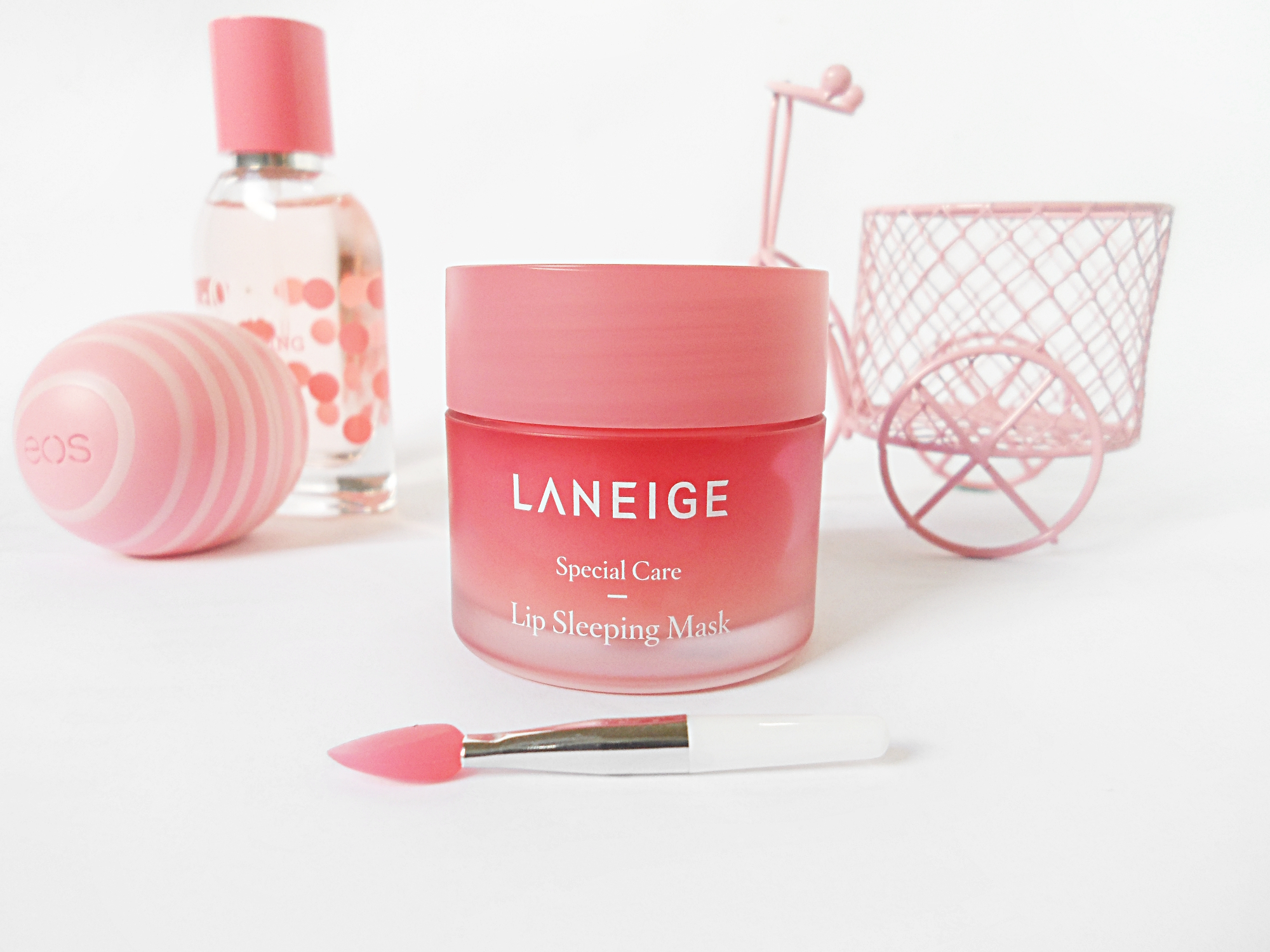 a close-up of a lip care mask by laneige brand laying on a white background in a studio