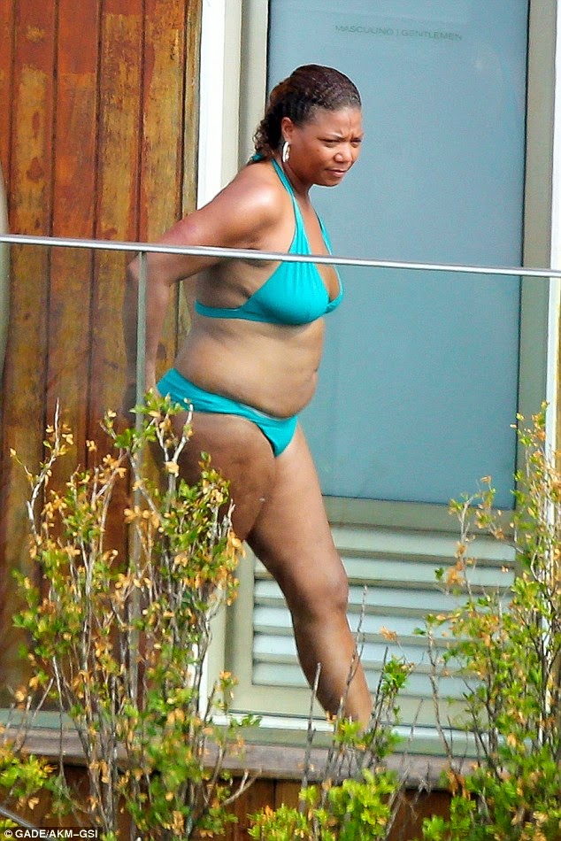 44 year old Queen Latifah put her sexy body on display as she hit the beach...