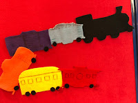 flannel train with engine, coal car, box car, tank car, coach car, and caboose