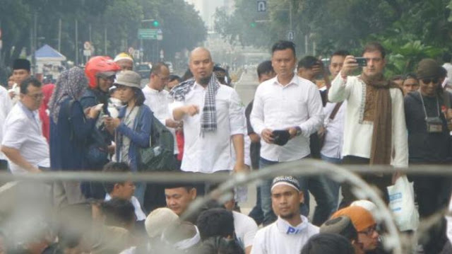 Ahmad dani was reported of allegedly defaming speech against jokowi