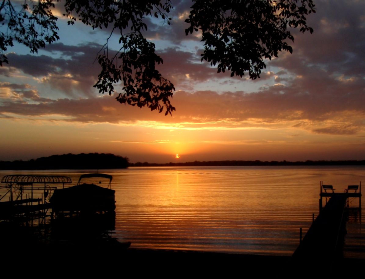 Sunsets across the water at Dickersons Lake Florida Resort near