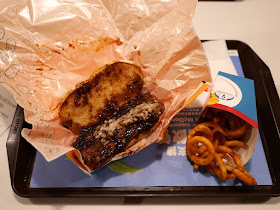 Lunar New Year Prosperity Burger and curly fries at a McDonald's in Hong Kong