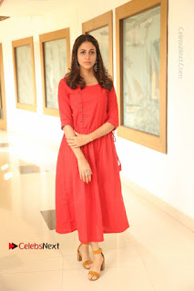 Actress Lavanya Tripathi Latest Pos in Red Dress at Radha Movie Success Meet  0001