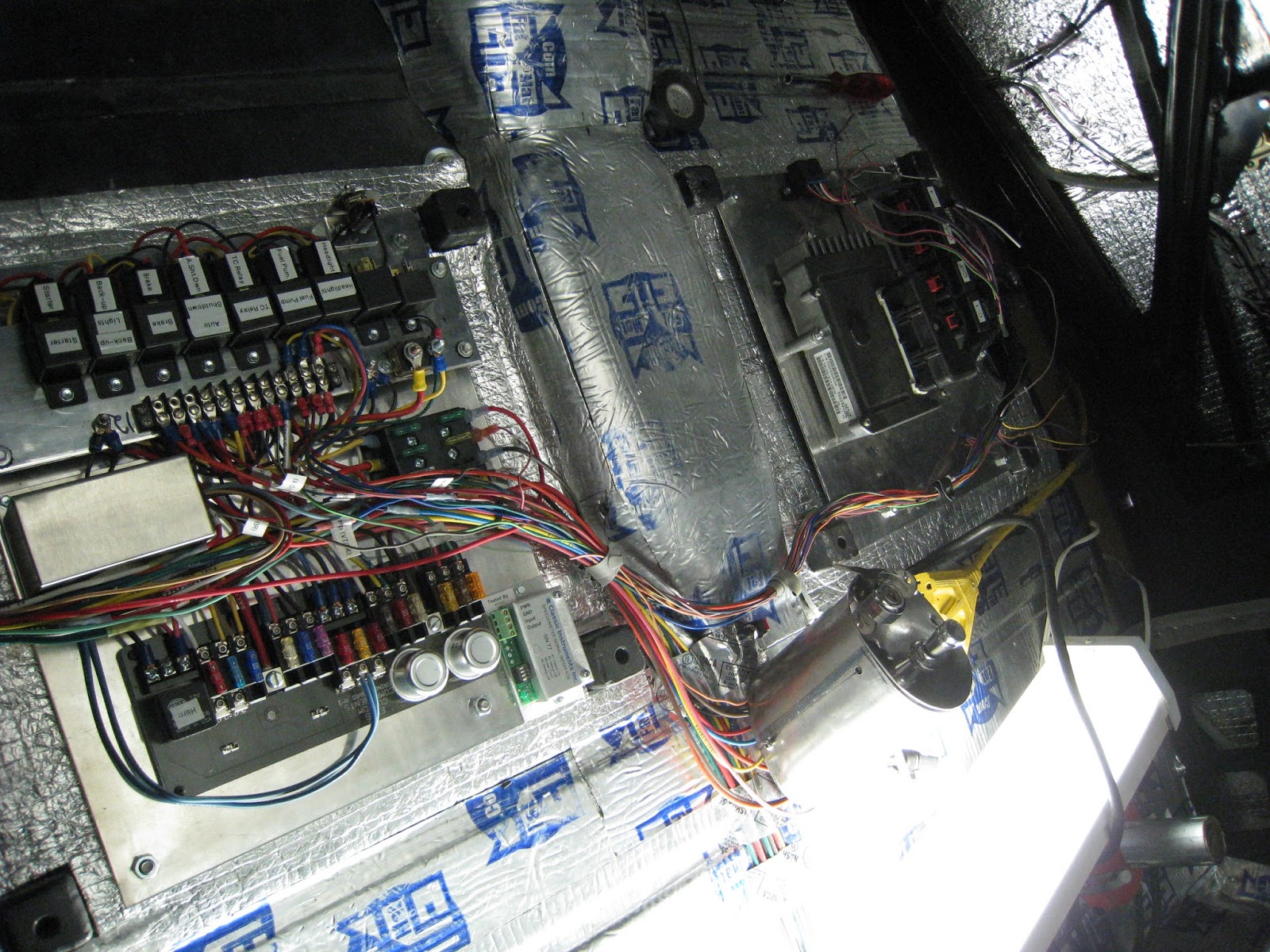 1937 Plymouth: Wiring pallets complete. Fuses and relays under drivers