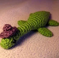 http://www.ravelry.com/patterns/library/nessie-the-loch-ness-monster-3
