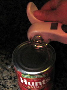 This simple safe cut can opener opens the can without leaving a sharp edge on the lid