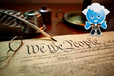 Image of the Constitution, a quill, 18th century glasses and Rio Mascot Splash in 18th century colonial wear.