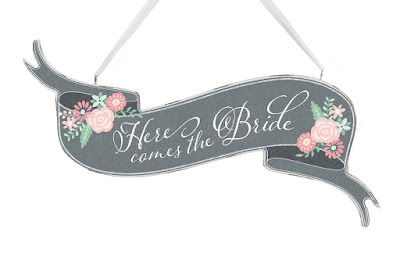 Add a bit of personality to your wedding and pick up one of these wedding signs for flower girls and ring bearers to carry. You can find 10 great ones in this list from www.abrideonabudget.com.