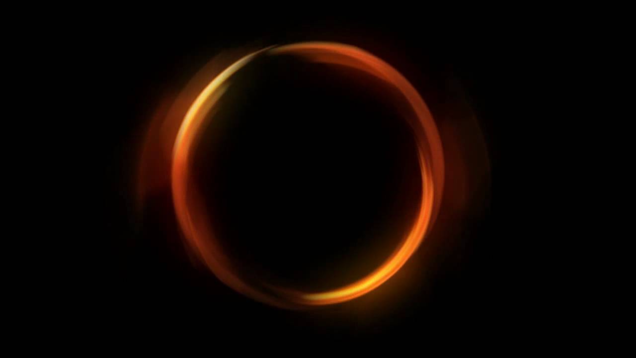 Round effects. Светящийся круг на черном фоне. Неоновое кольцо. Кольцевой блик. Золотой круг на черном фоне.