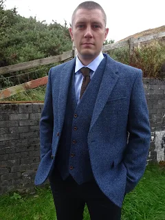 handsome man in tweed jacket and trousers 