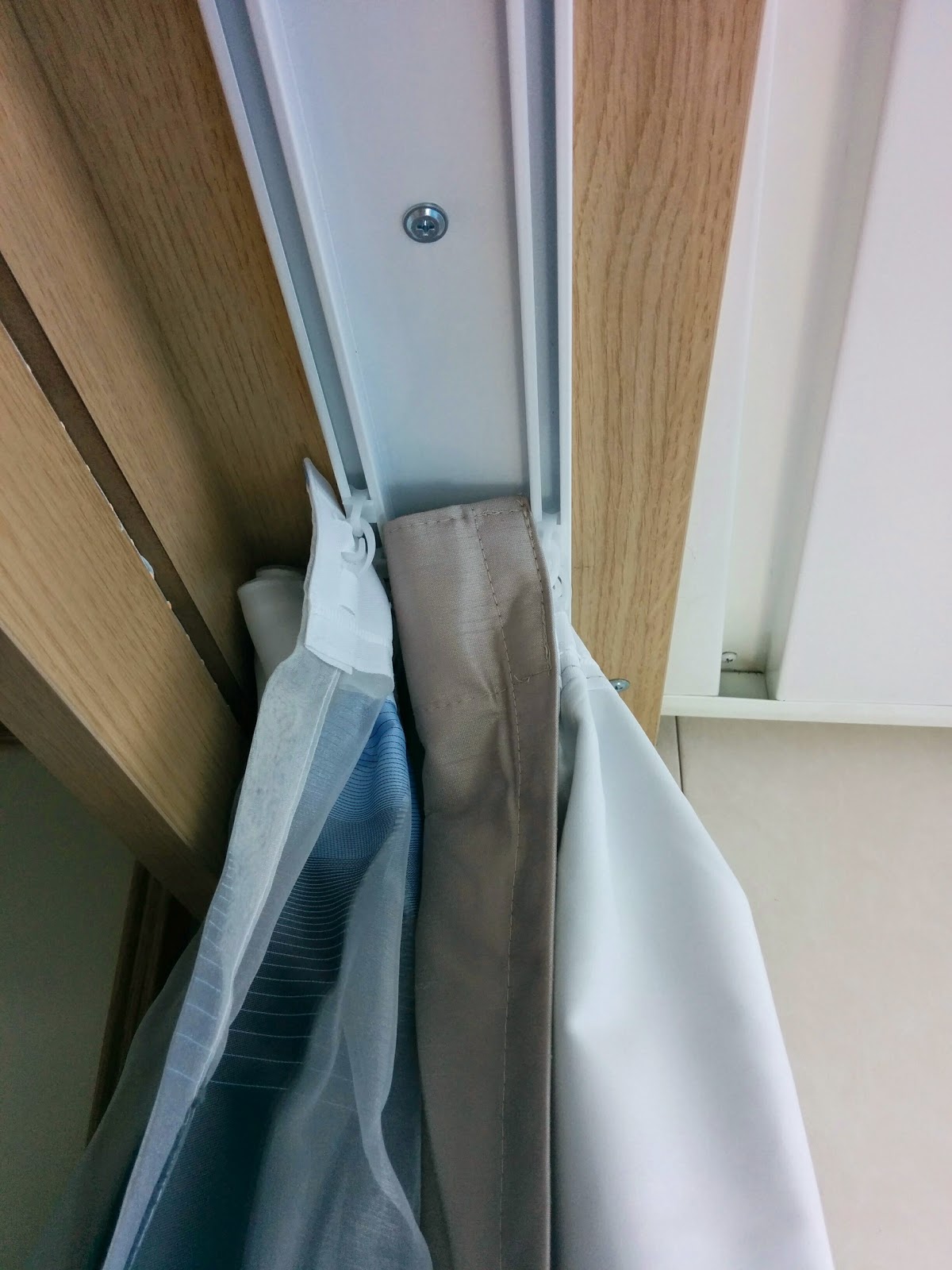 Ceiling mounted curtain tracks