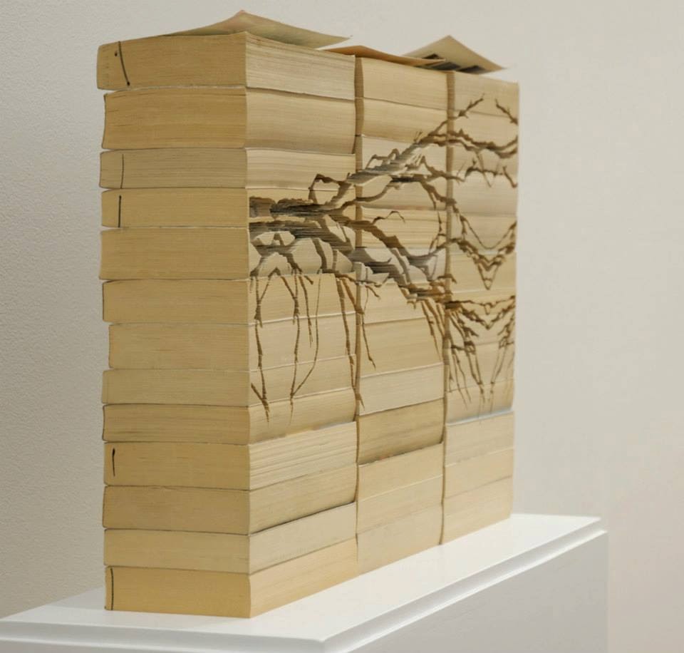 02-Kylie-Stillman-Book-and-Page-Carving-Art-www-designstack-co
