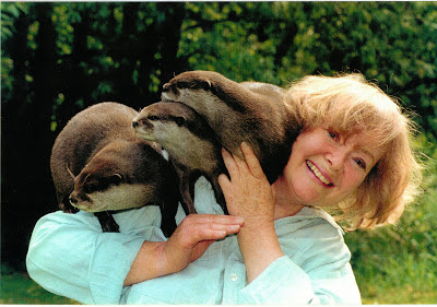 Daphne Neville with her tame otters