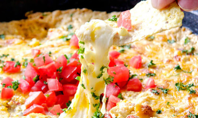 https://carlsbadcravings.com/cheesy-salsa-verde-corn-dip-recipe/