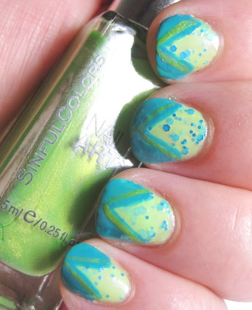 Blue Pistachio with a chevron tip in OPI Fly and Sinful green