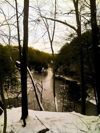 view of saugatuck river snow covered and ice forming on January first - taken from the Saugatuck trail nearest Deer Hill RD.