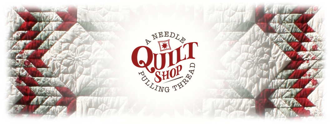 A Needle Pulling Thread Quilt Shop