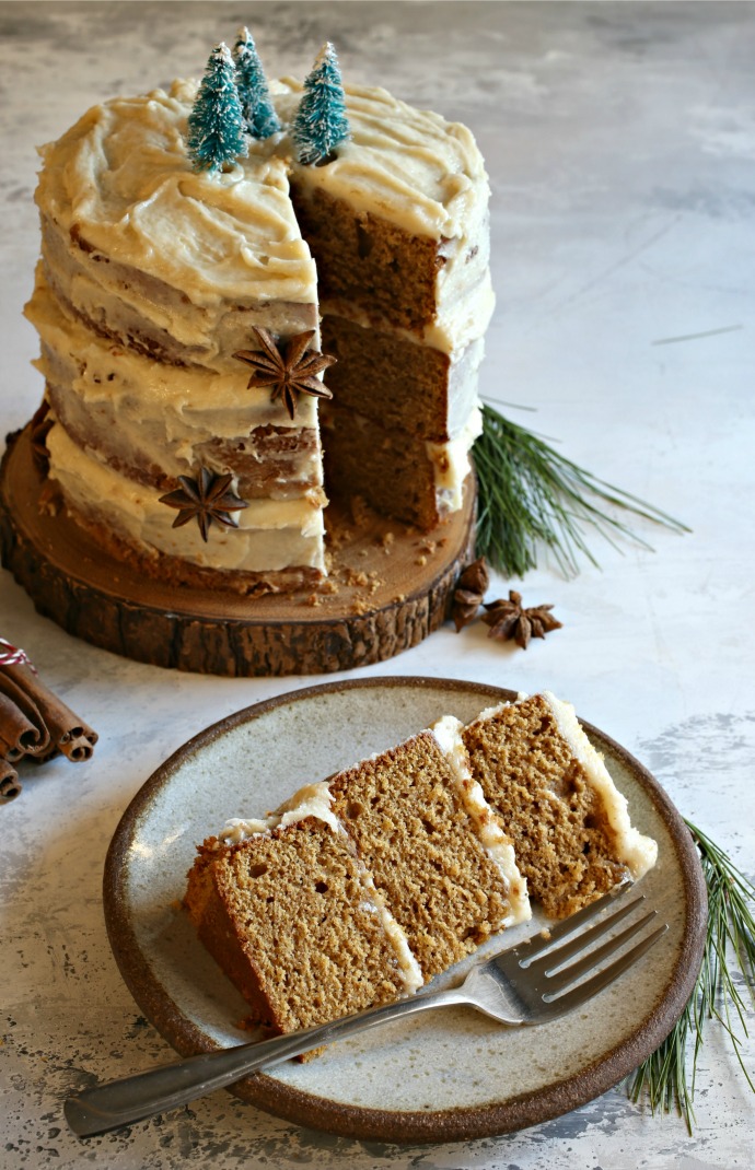 Gingerbread layer cake covered in tahini cream cheese frosting.