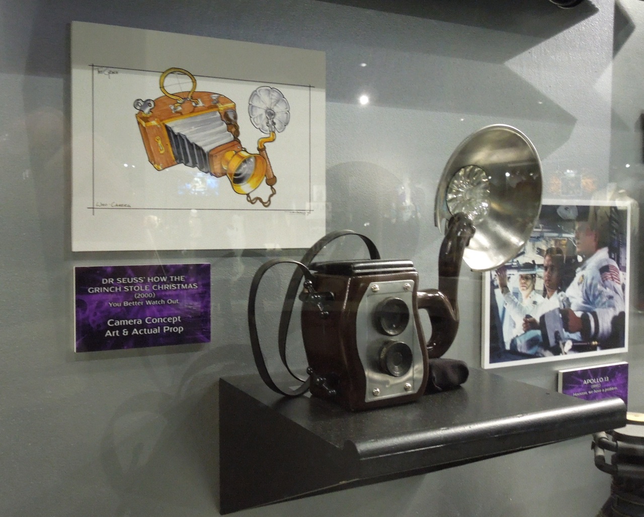 Hollywood Movie Costumes and Props The Grinch's Santa suit and camera