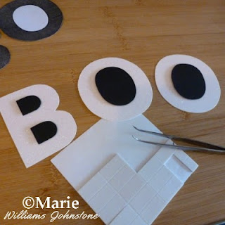3D foam pads are used with craft tweezers to make lettering that pops