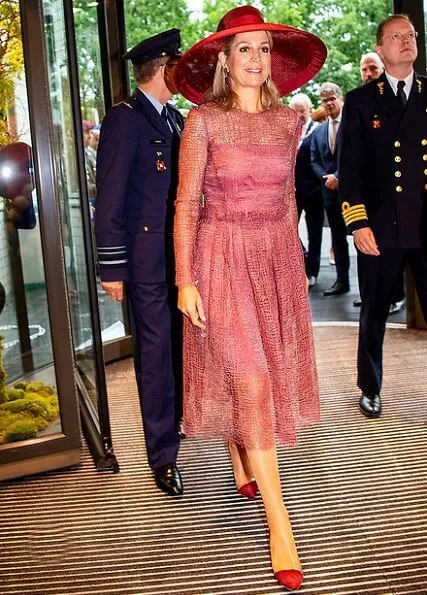Queen Maxima's dress is by Belgian fashion house Natan