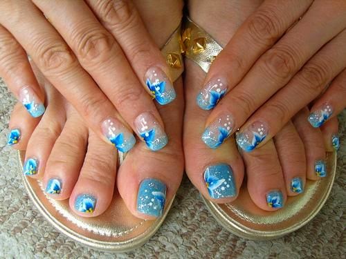 5. Floral and Leafy Toe Nail Designs for a Summer Tropical Look - wide 6