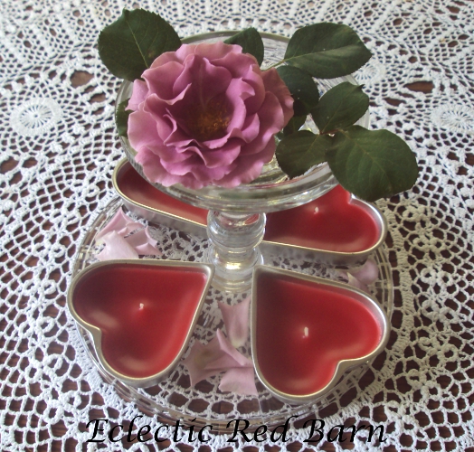 Heart-shaped Tins as Candles with a Rose