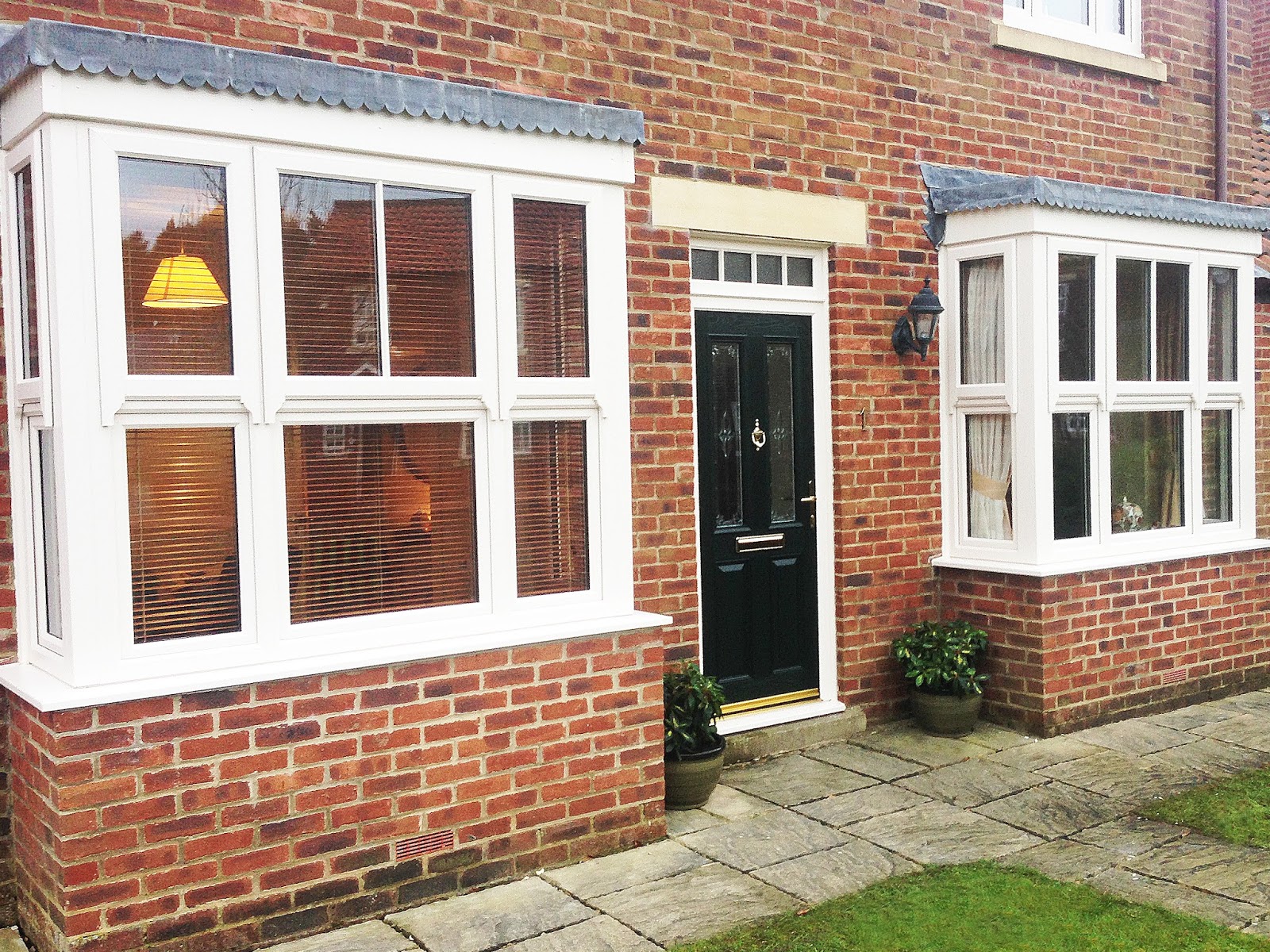 Full house of Box Sash Bay Windows, with Beautiful Green Composite door