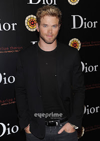 supports Charlize Theron's