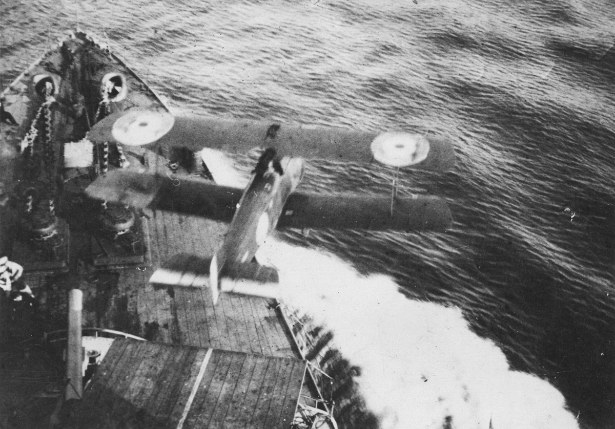 Sea launch. Original caption: Aeroplane leaving a light cruiser.