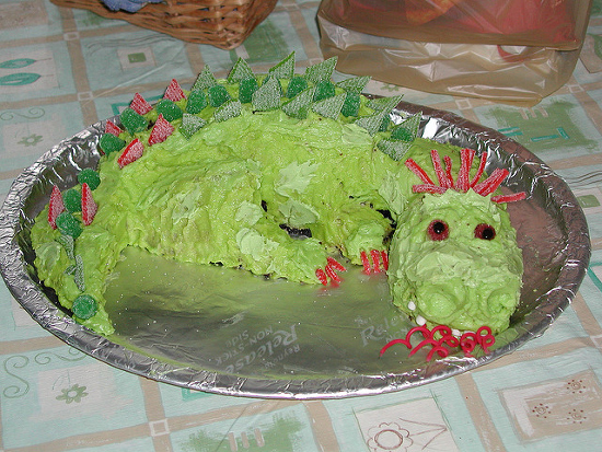 Dragon shaped birthday cake green red