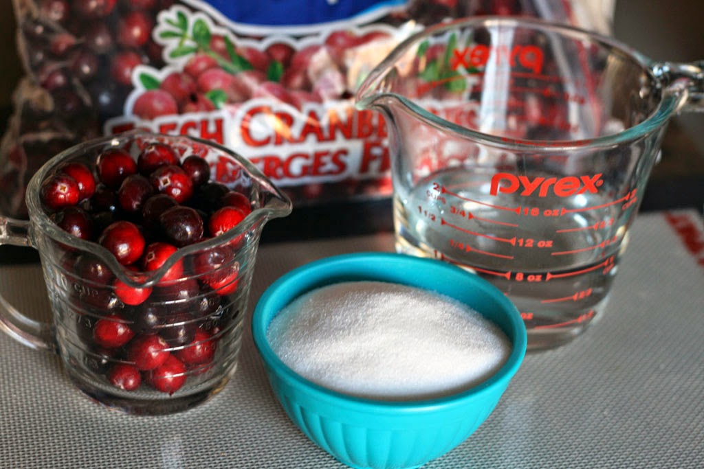 Mise-En-Place: A cup of fresh cranberries, a cup of sugar, and a cup of water.