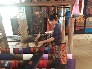 Embroidery weaving in Ban Xanghai village popularly known as "Whisky Village"