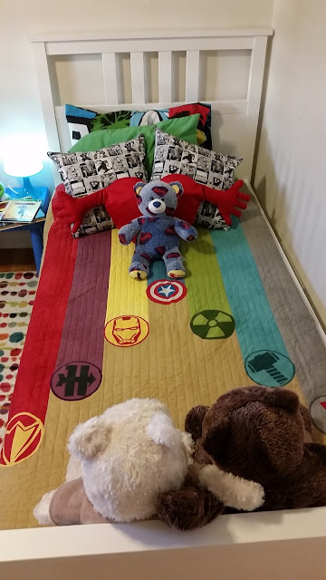 Perfect boy's super hero room, not too over-done. Features custom made Marvel Avengers quilt by Sew at Home Mummy. Super cool boys room rug! would hide the stains. Custom IKEA hack curtains, looks easy - add panel to top of blackouts. 