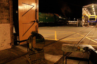 plein air nocturne oil painting of steam locomotive 3642 steaming outside the Large Erecting Shop, Eveleigh Railway Workshops by industrial heritage artist Jane Bennett