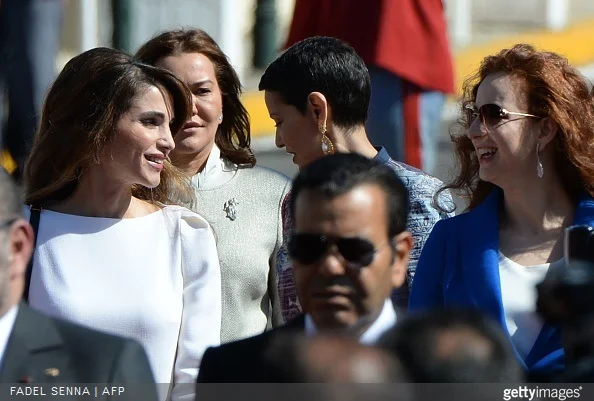 Jordan's Queen Rania and Morocco's Princess Lalla Salma attend a welcome ceremony at the Royal Palace in the Moroccan city of Casablanca