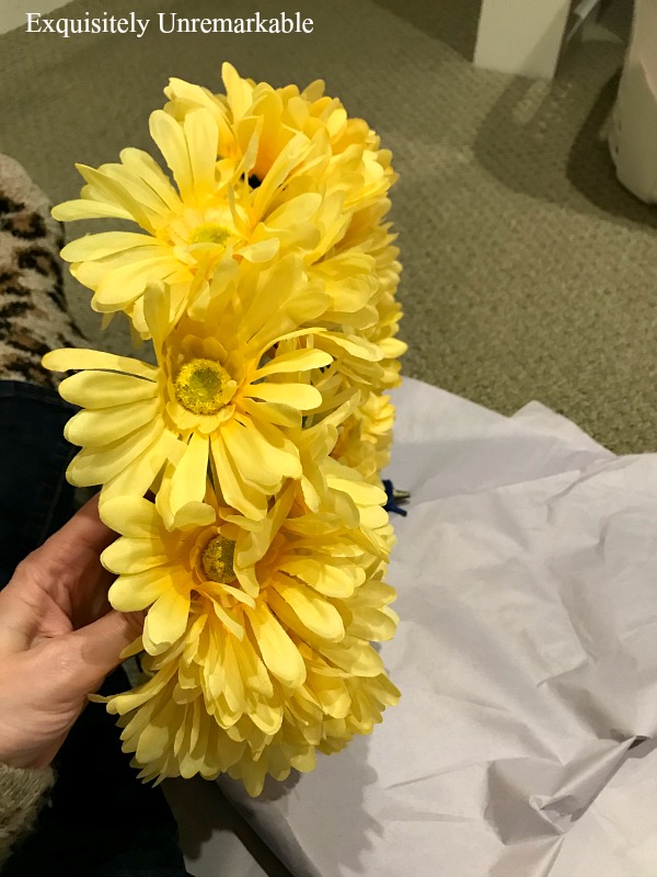 Yellow daisy wreath flowers added to foam