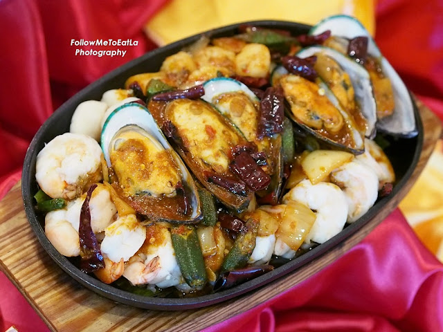  Pan Fried Trio Seafood with Spicy Sauce on Hot Plate