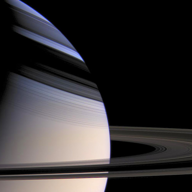 Striking view of Saturn embraced by the shadows of its Rings