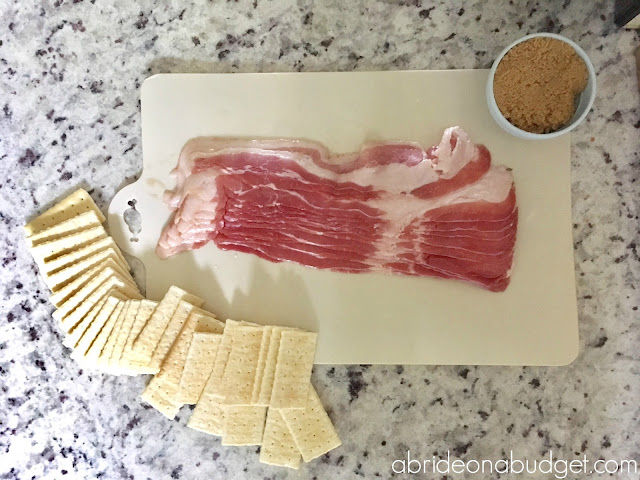 Looking for the perfect party appetizer? Make these bacon-wrapped crackers topped with brown sugar from www.abrideonabudget.com. They're great for bridal showers.
