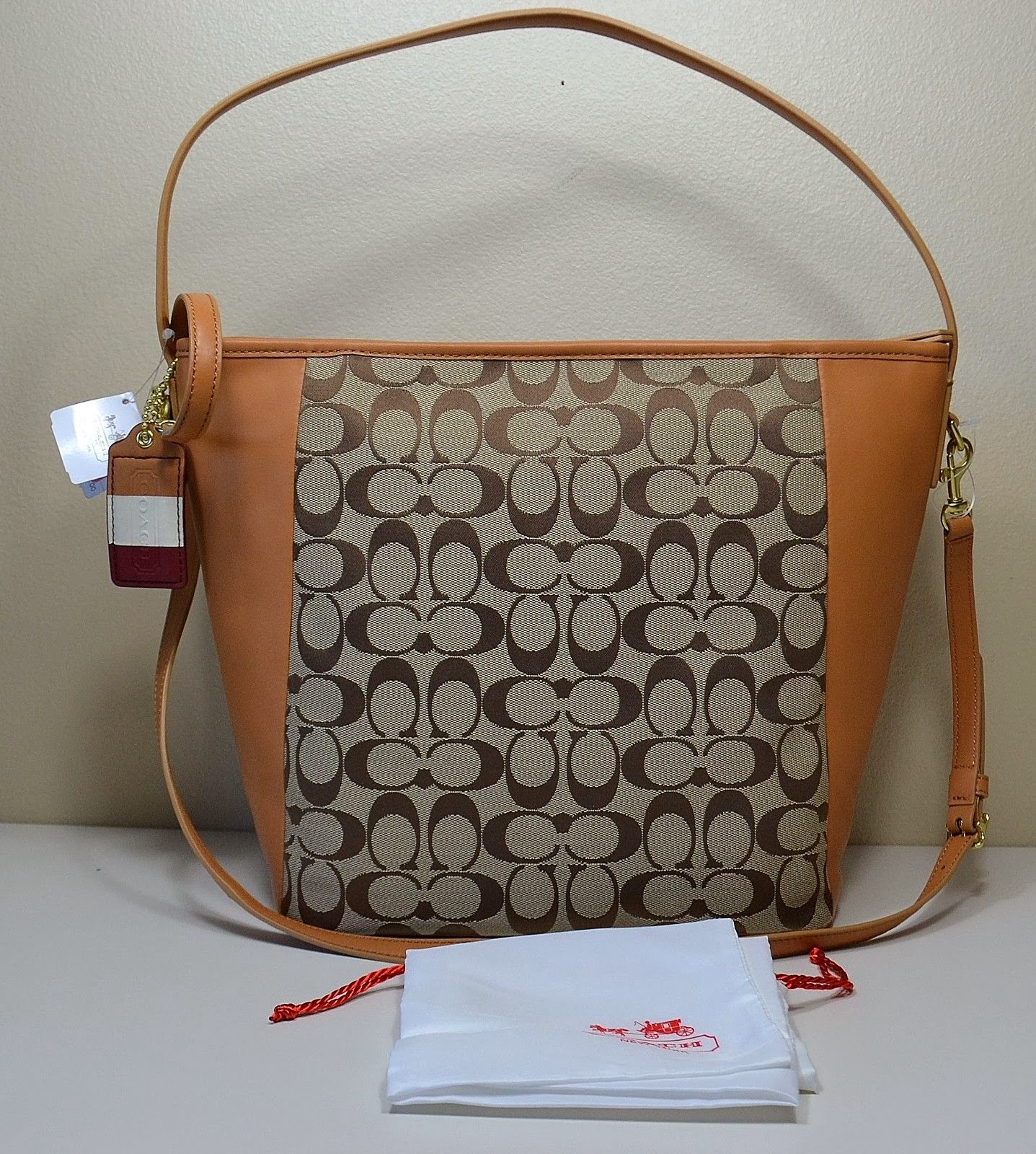 Branded And Beautiful: Coach Legacy Weekend Signature Shoulder Bag 23488