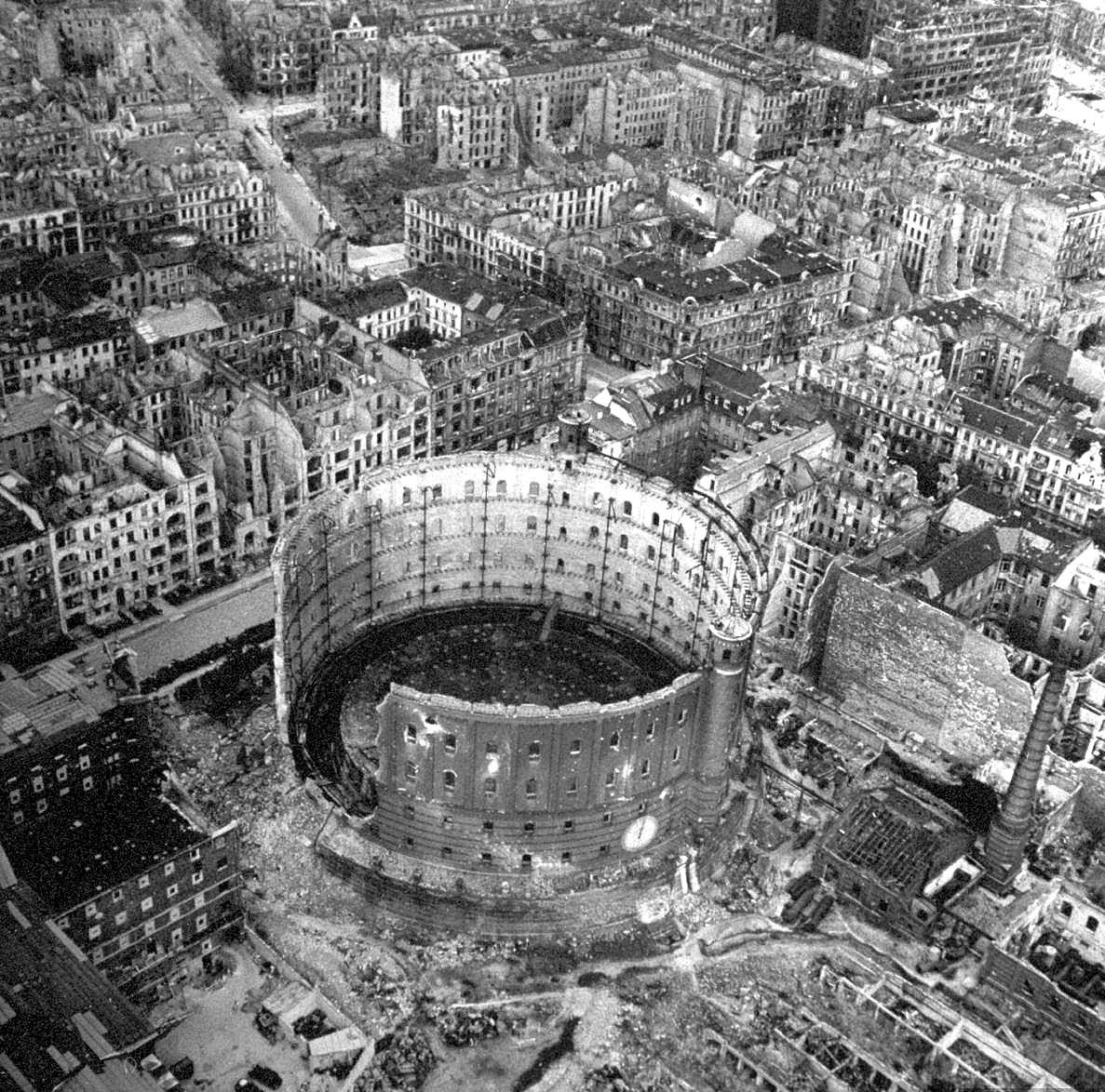 Excellent aerial view showing devastation and bombed out buildings over wide area.