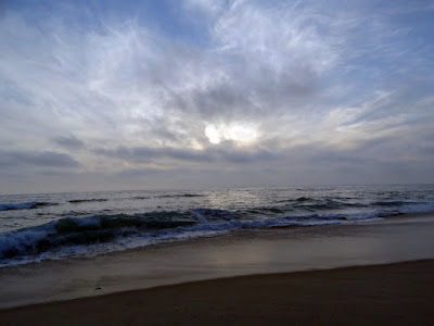 Carlsbad Beach Sunset despite Heavy Cloud Cover by Stacey Kuhns