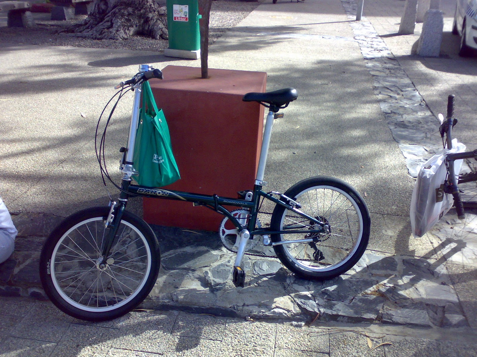 Cycling in Cape Town A Dahon Folding Bicycle with a Clever Bag Carrier.