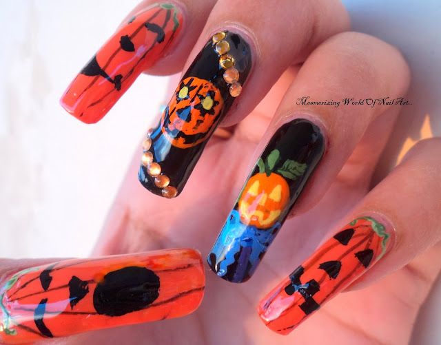 10. Halloween Nail Art with Pumpkins - wide 4