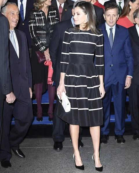 Queen Letizia wore a new flare striped cocktail dress by Carolina Herrera