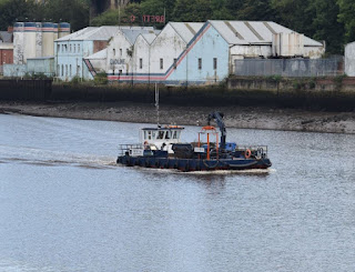 Port of Tyne's 'Clearwater' boat passes Brett Oils