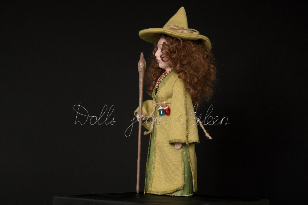 OOAK Celtic witch doll dressed in green with magic staff, view from the side