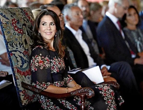 Crown Princess Mary wore Dolce & Gabbana Floral Panel Dress, Naledi Copenhagen Allana Latte Ostrich Clutch, photographer Marco Grop